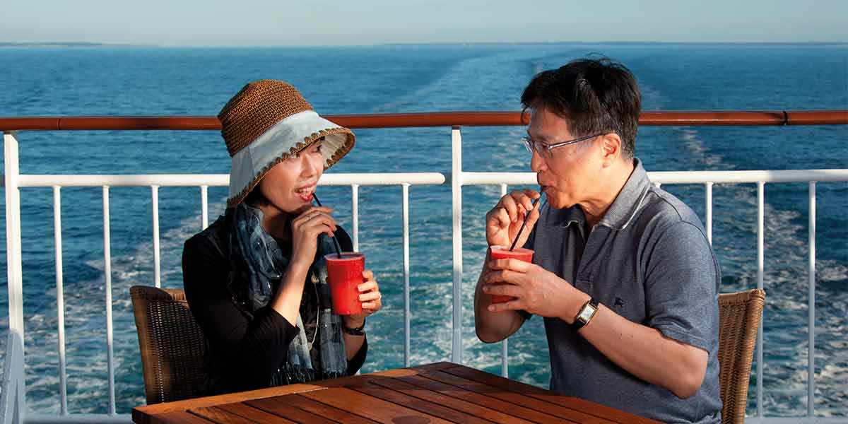 Young family on the deck of a DFDS ferry at sunset couple-on-deck-21-02-2019-1